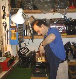 Emilio Allodi repairing an accordion in his workshop